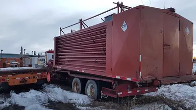 USED 28 M3 (180 BBL) SKID MOUNTED 2 COMPARTMENT MUD TANK