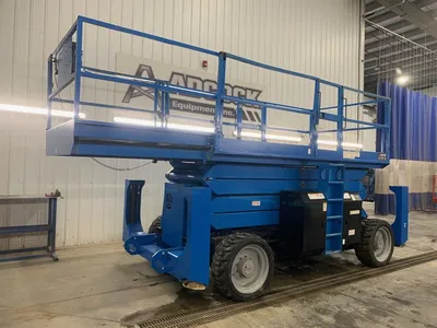 Used 2014 GENIE GS-4390RT ROUGH TERRAIN SCISSOR LIFT Scissor Lifters Alberta CA | Adcock Equipment #1418030