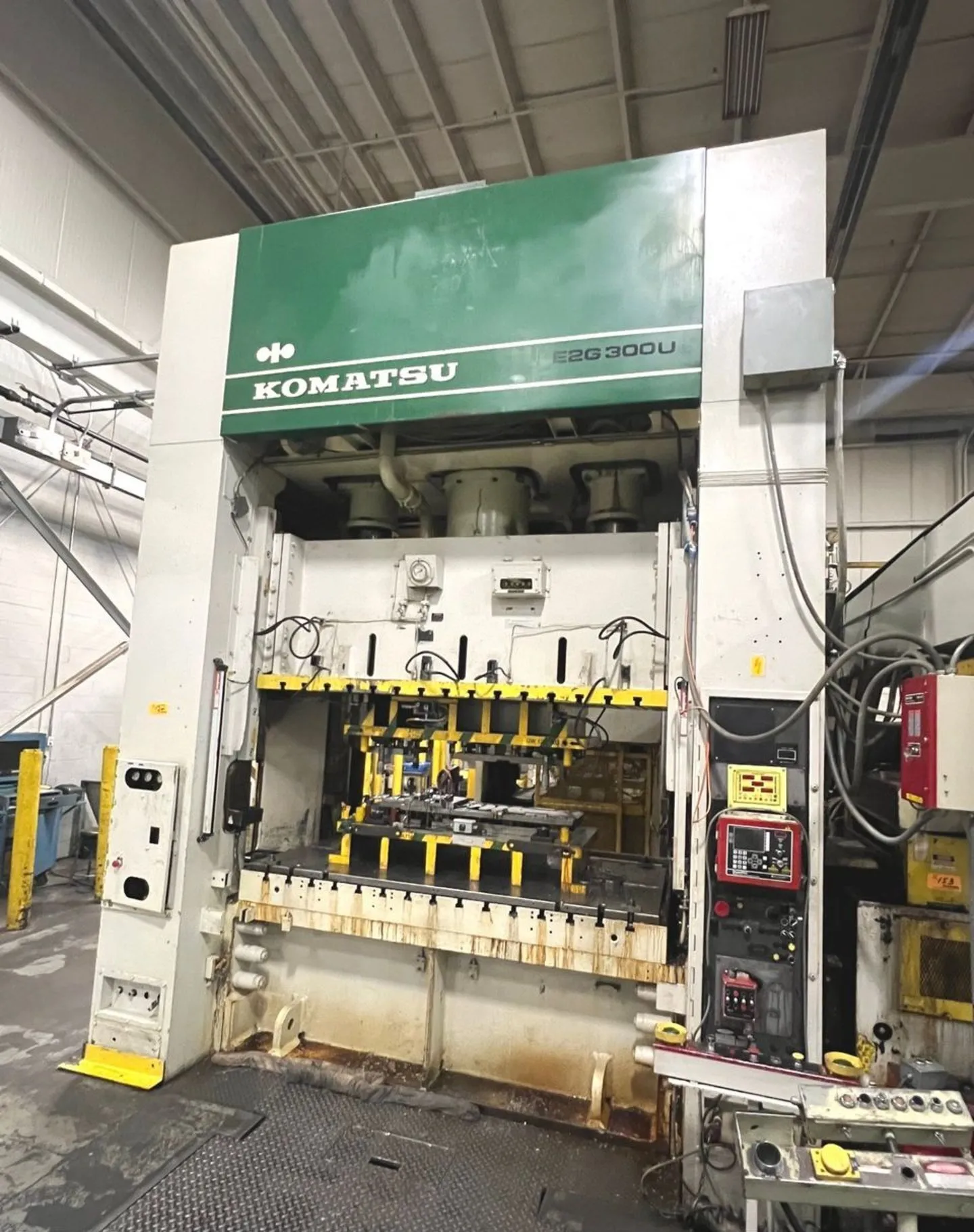 300 Ton Komatsu Straight Side Mechanical Press, 98.4" x 49.2" bed area, 14.2" stroke length