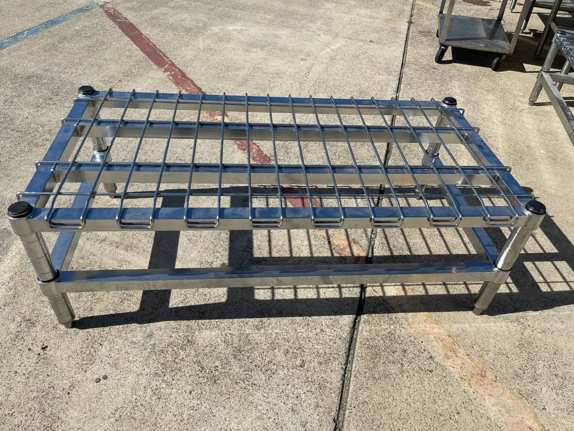Used Metro Used 48" x 24" Metro HDP55C Heavy Duty Dunnage Rack with Wire Mat 3000lb Capacity - SS271 Racks/Shelving Illinois US | Falcon Restaurant Supply #1375865