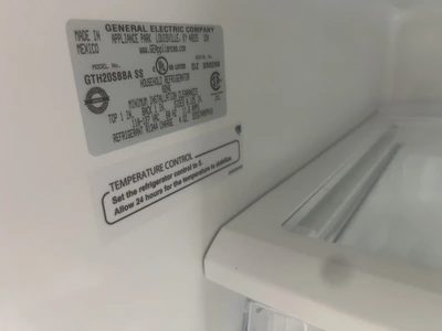 USED GE FREEZER ON TOP