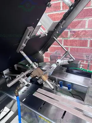 USED ECONOSEAL E SYSTEM 2000 ECONOSEAL CARTONER W/  HOT GLUE SEALING