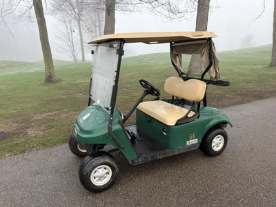 (1) 2017 E-Z-Go golf cart with a Kawasaki gas engine, model 625111G01, includes canopy, ball cover, ...