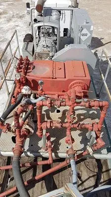 USED NATIONAL JWS-165L TRIPLEX WELL SERVICING REVERSING MUD PUMP TRAILER