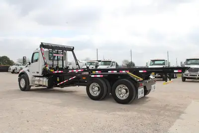 New | in-Stock 2027 PETERBILT 548 Rolloff Trucks Texas US | Roll Off Truck World #1492003