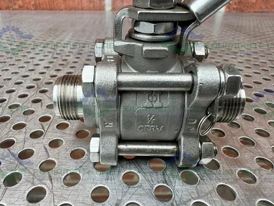 USED INLINE INDUSTRIES STAINLESS STEEL BALL VALVE W/ 1/2" SANITARY FITTING