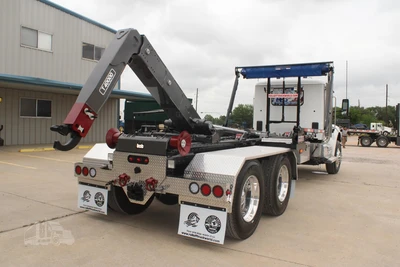 Used 2027 PETERBILT 548 Hooklifts & Roll-Offs Texas US | Roll Off Truck World #1491992