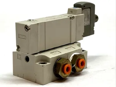USED SMC SOLENOID VALVE 5-PORT 24VDC 1/4" BASE MOUNT