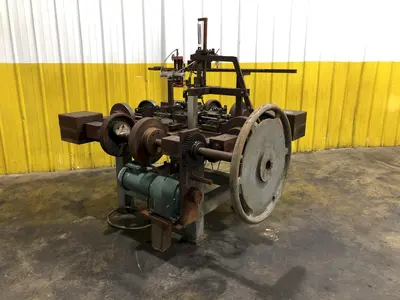 FOUR SLIDE WIRE FORMING MACHINE: STOCK #18987