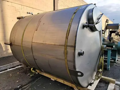 Used approximately 2400 gallon vertical stainless steel sanitary mix tank