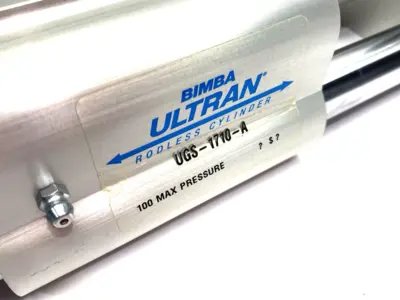 USED BIMBA ULTRAN GOLD COUP. STRENGTH RODLESS SLIDE CYLINDER, DBL-ACTING