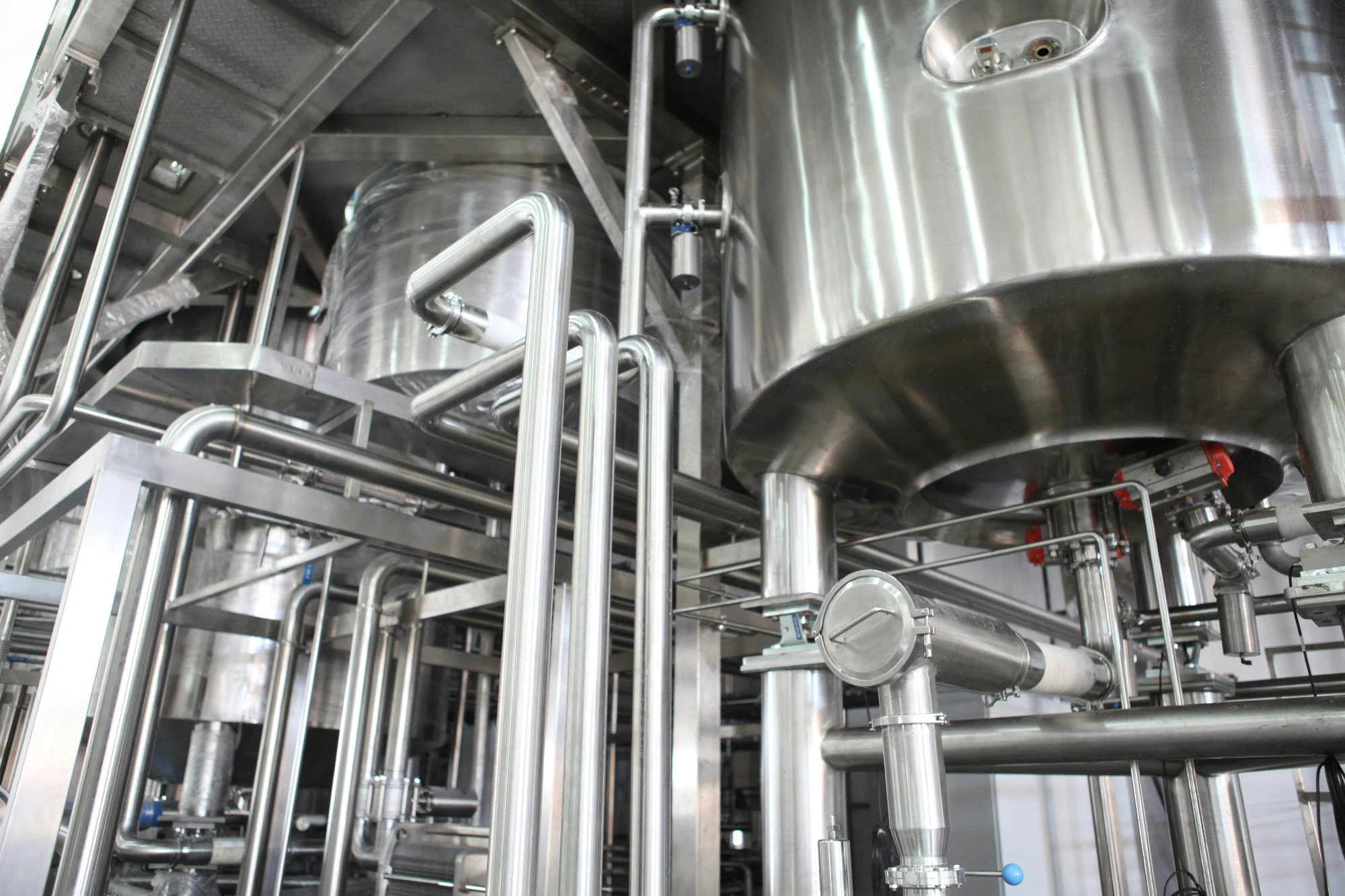 Industrial equipment inside a modern processing facility