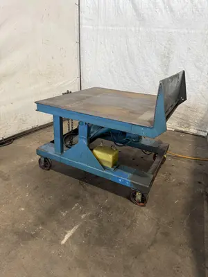 4,000 LB X 48" X 48" HYDRAULIC TILT TABLE. STOCK # 1003925.
