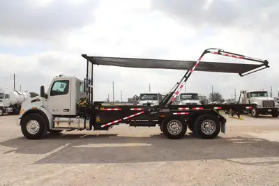 New | in-Stock 2027 PETERBILT 548 Rolloff Trucks Texas US | Roll Off Truck World #1492003