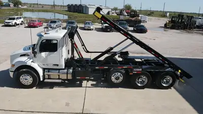 New | in-Stock 2027 PETERBILT 548 Rolloff Trucks Texas US | Roll Off Truck World #1492012