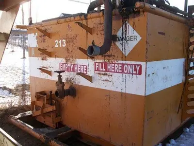 USED 24 M3 (150 BBL) SKID MOUNTED 2 COMPARTMENT MUD TANK