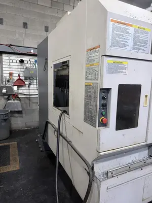 Used 2011 OKUMA GENOS 560V Vertical Machining Centers Illinois US | Machinery Marketing International #1229251