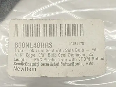 NEW TRIM-LOK TRIM SEAL WITH SIDE BULB 1/16" EDGE 3/8" BULB SEAL DIA 25' L