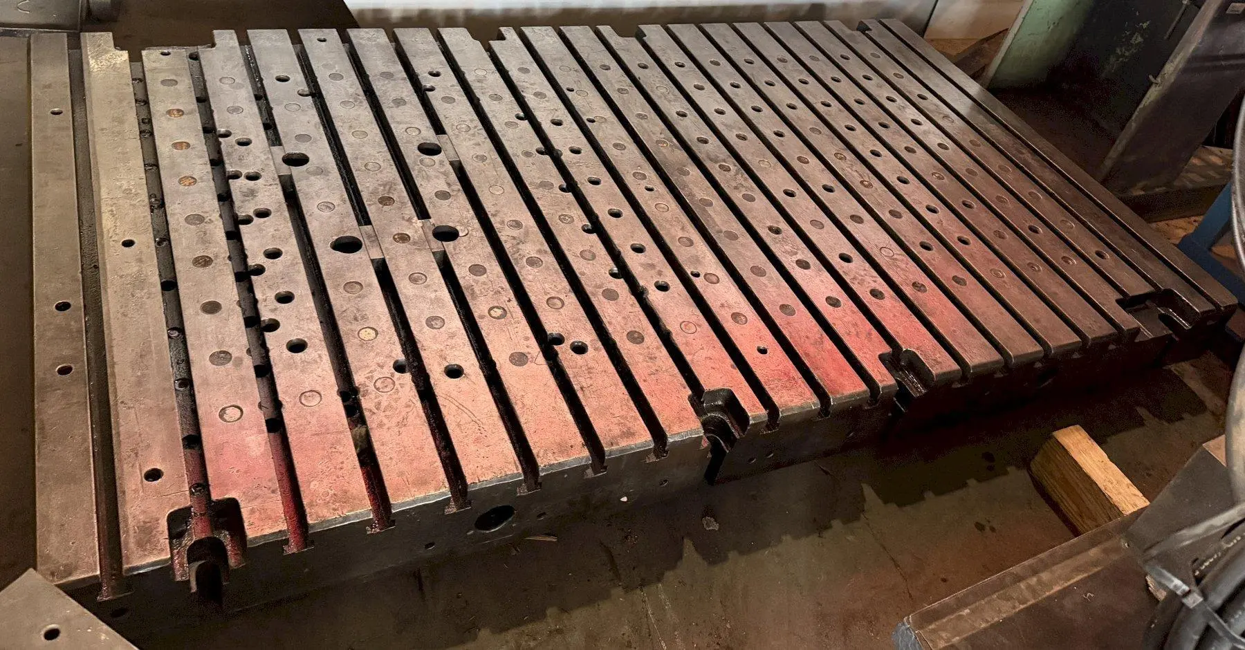 60" WIDE X 108" LONG X 8" THICK T-SLOTTED BOLSTER PLATE. STOCK # 0541526