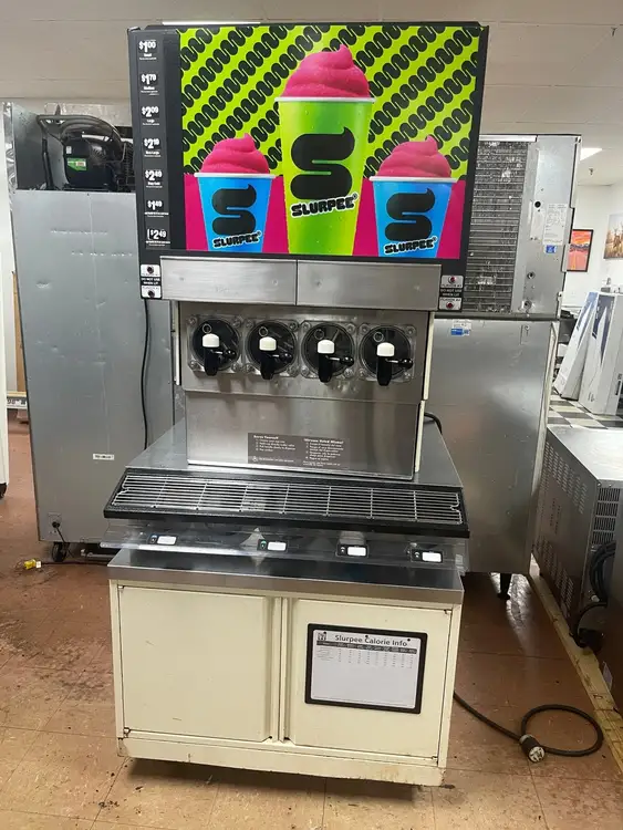 Used FBD MFG Used FBD 564 Frozen Beverage 4 Flavor Dispenser with Drink Station Stand As-Is 220V Slushie Machines Illinois US | Falcon Restaurant Supply #1375592