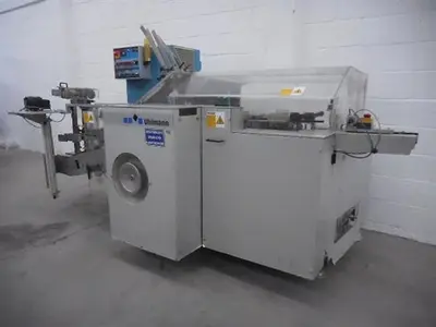 Uhlmann model C100 horizontal cartoner.