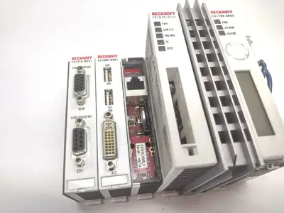 CX1010-0121, CX1100-0002, CX1010-N031, CX1000-N001 | Beckhoff CX1010-0121 CPU Module with CX1100-0002 Power Supply - For parts or not working