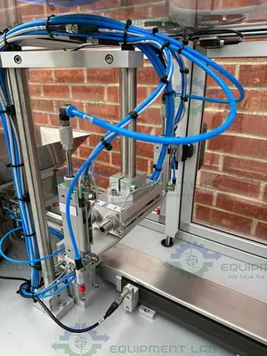 USED ROTEC PISTONMACHINE FOR VIAL CAPS / STOPPERS W/ VIBRATORY FEEDER BOWL