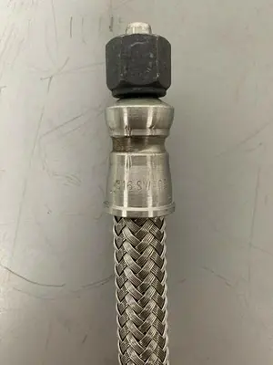 USED 35" STAINLESS STEEL BRAIDED HOSE W/ 5/8" SWAGELOK 316 3100 PSIG CONNECTION