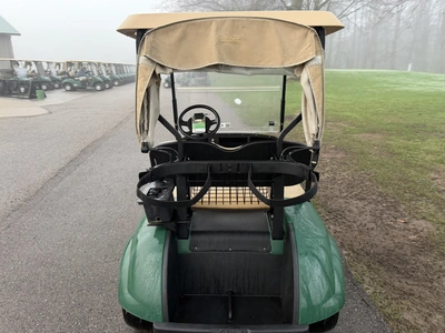 (1) 2015 E-Z-Go golf cart with a Kawasaki gas engine, includes canopy, ball cover, club cover, fold-...