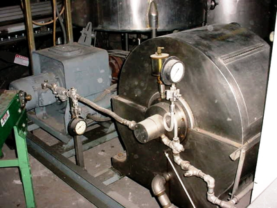 Liquid Quadronics centrifugal contactor, 316SS.