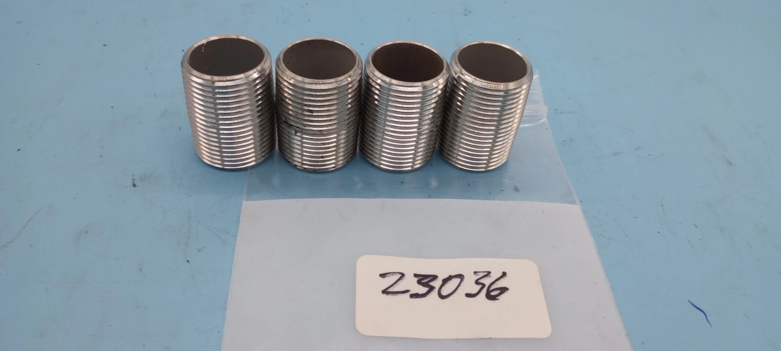 LOT 0F 4 SS UNION  NIPPLES 7/8" X 13/8"