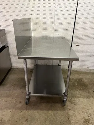Used Falcon Restaurant Supply Used 48"X30" Stainless Table with 16" Backsplash on Casters - FG Food Prep Tables Illinois US | Falcon Restaurant Supply #1375231