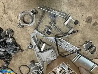 Lot of assorted items including (7) Routers for Parts or Repair, four routers power on/work but...