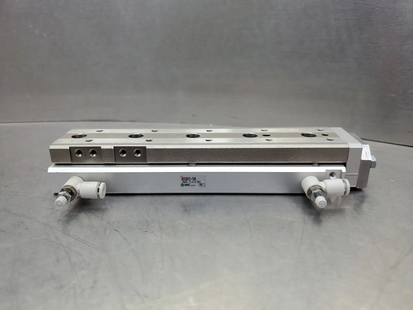 SMC MXQR12-100 0.15-0.7MPa Pressure Cylinder Module. 6-E1