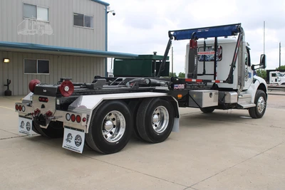 Used 2027 PETERBILT 548 Hooklifts & Roll-Offs Texas US | Roll Off Truck World #1491992