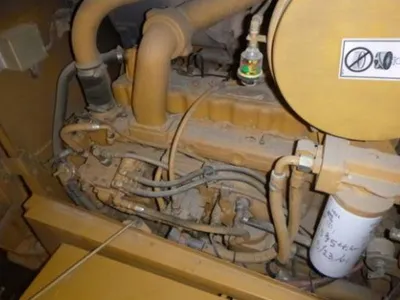 2002 Caterpillar 140HNA