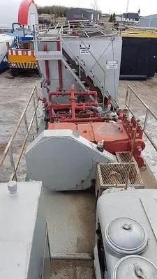 USED NATIONAL JWS-165L TRIPLEX WELL SERVICING REVERSING MUD PUMP TRAILER