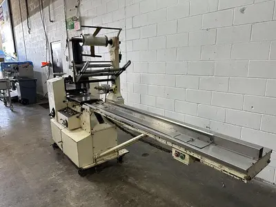 USED DOBOY PACKAGING MACHINERY INC MUSTANG