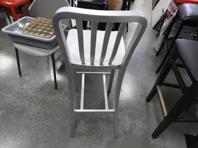 Used Falcon Restaurant Supply Used Aluminum Light Weight Silver Navy Indoor / Outdoor Bar Height Stool with Vertical Slat Back Restaurant Front of House Furnishings Illinois US | Falcon Restaurant Supply #1376610