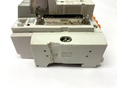 USED SMC PNEUMATIC MANIFOLD ASSEMBLY 1/4" PORTS 24VDC DAMAGED