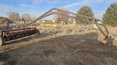 USED STERLING 12' COIL TYPE PLOW PACKER WITH GOOSENECK HITCH