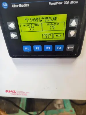 AMS  #A100-auger filler with foot pedal control