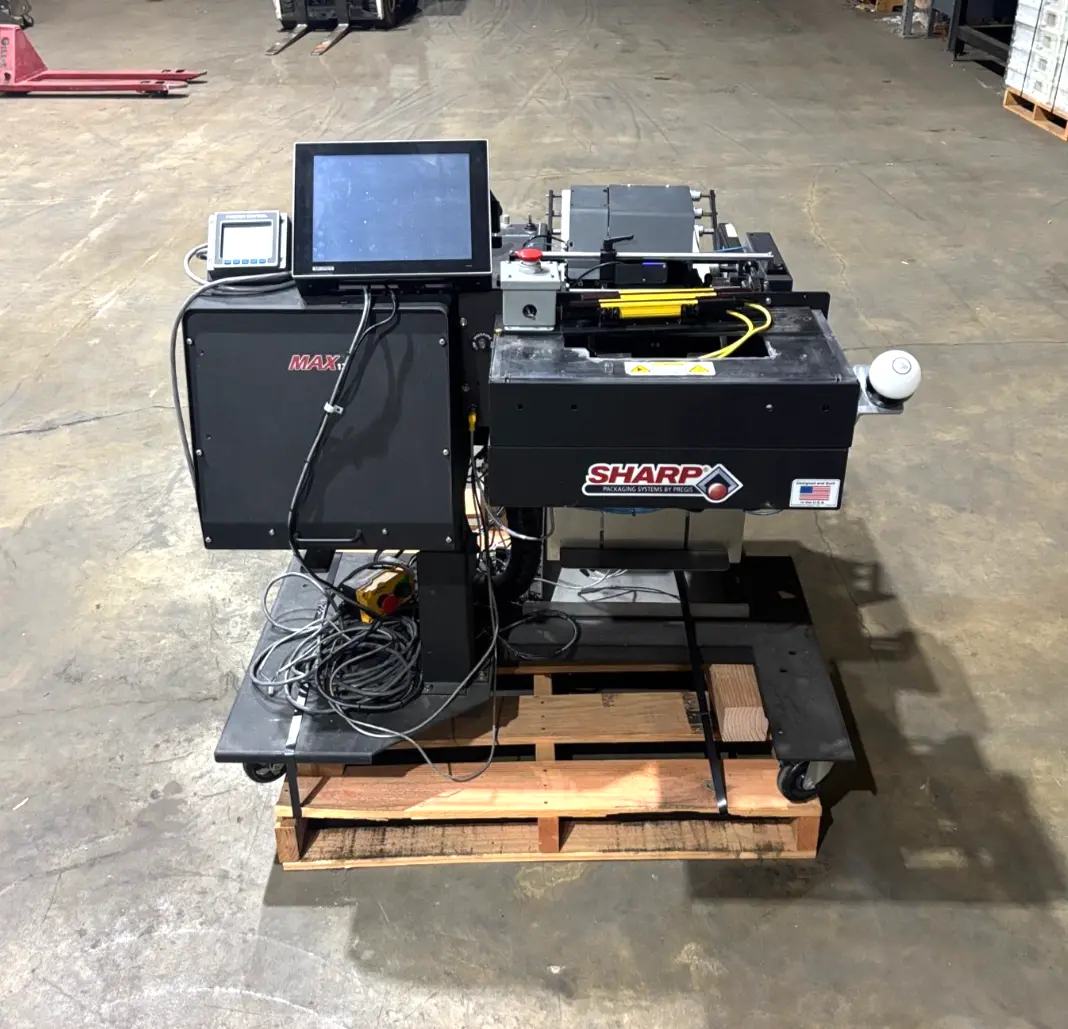 Used SHARP CONTINUOUS ROLL BAGGING SYSTEM MARK II, BAGGER MACHINE Baggers Michigan US | Maverick Industrial Sales #1090084