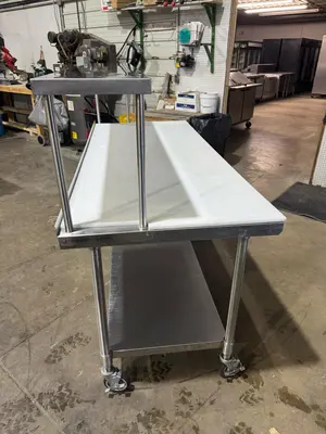 Used John Boos Used John Boos 36"x72" Stainless Table with Overshelf, Casters and Cutting Board Food Prep Tables Illinois US | Falcon Restaurant Supply #1375674