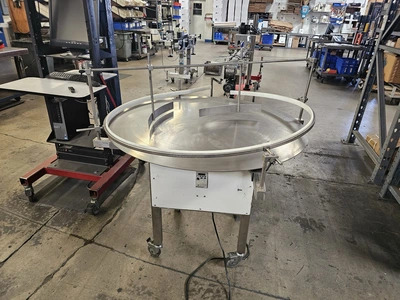 USED 1900 ACCUTEK/CHADAM 2 HEAD GRAVITY FILLER