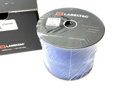USED LABELTAC PRO MODEL HIGH PERF. 10 YEAR VINYL LABEL, BLUE, 4" X 150' ROLL