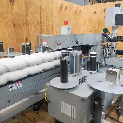 LSI Front and Back Labeler with integrated hold down