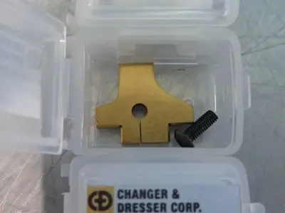NEW CHANGER & DRESSER CORP KTW(U)556