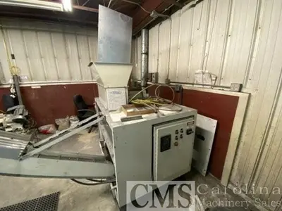 USED 2005 PUCKMASTER BRIQUETTE MACHINE