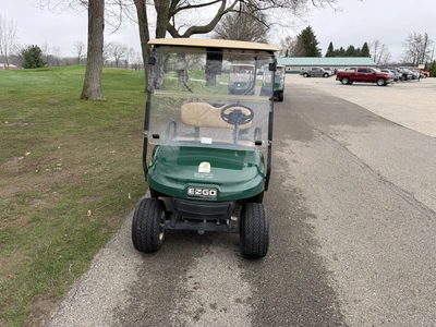 (1) 2015 E-Z-Go golf cart with a Kawasaki gas engine, does not include Club canopy, includes ball wa...